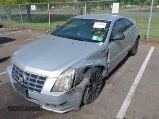 2014 Cadillac CTS z VIN 1G6DA1E32E0163864, wystawiony jako IAAI lot #42144299 z przebiegiem 139 957 mil mil oraz . Historia ofert i sprzedaży dostępna na DreamBid. Obrazek 2.