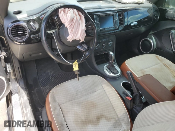 2016 Volkswagen Beetle Wolfsburg Edition with VIN 3VWF17AT8GM637442, listed as a Copart auction lot 55034595 with 137,211 mi miles and Salvage Title. Bid and sale history available at DreamBid. Image 8.