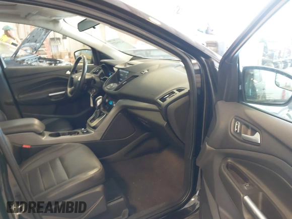 2014 Ford Escape SE with VIN 1FMCU9G95EUA16328, listed as a IAAI auction lot 42464235 with 108,570 mi miles and . Bid and sale history available at DreamBid. Image 5.