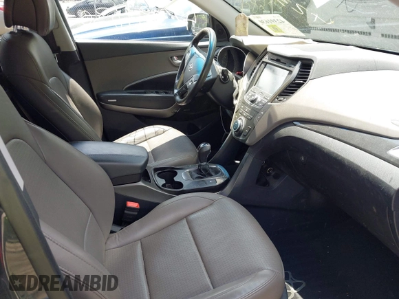 2014 Hyundai Santa Fe with VIN 5XYZUDLB6EG218980, listed as a IAAI auction lot 42391630 with 136,710 mi miles and . Bid and sale history available at DreamBid. Image 5.