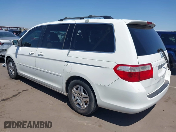 2005 Honda Odyssey EX with VIN 5FNRL38465B081716, listed as a IAAI auction lot 41998956 with 173,182 mi miles and . Bid and sale history available at carsss.com. Image 3.