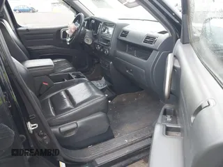 2011 Honda Ridgeline RTL with VIN 5FPYK1F53BB001385, listed as a IAAI auction lot 41945219 with 168,713 mi miles and . Bid and sale history available at DreamBid. Image 5.