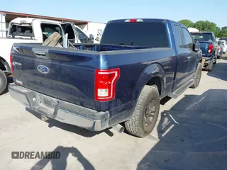2015 Ford F-150 XL with VIN 1FTEX1CP0FKE14845, listed as a IAAI auction lot 42013909 with 162,644 mi miles. Bid and sale history available at carsss.com. Image 4.