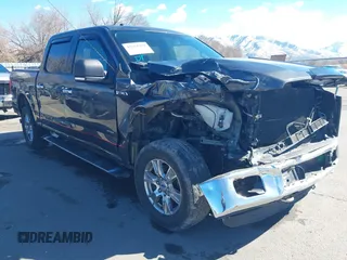 2015 Ford F-150 XLT with VIN 1FTEW1EG4FFC84691, listed as a IAAI auction lot 41651229 with 144,784 mi miles. Bid and sale history available at carsss.com. Image 1.