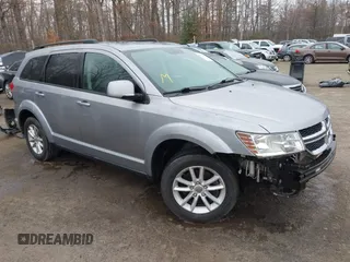 2016 Dodge Journey SXT with VIN 3C4PDCBG4GT122761, listed as a IAAI auction lot 41751265 with 130,304 mi miles. Bid and sale history available at carsss.com. Image 1.
