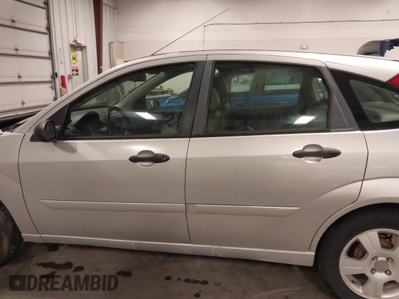 2007 Ford Focus S with VIN 1FAFP37NX7W330802, listed as a IAAI auction lot 41663895 with 147,015 mi miles and . Bid and sale history available at carsss.com. Image 15.