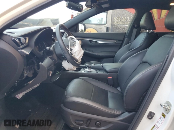 2023 Infiniti QX55 Essential with VIN 3PCAJ5KR2PF101501, listed as a Copart auction lot 57913585 with 13,999 mi miles and Salvage title. Bid and sale history available at DreamBid. Image 7.