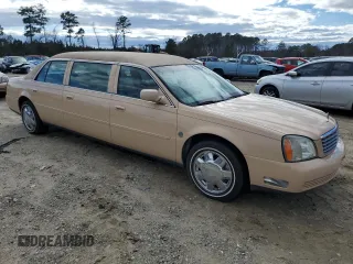2004 Cadillac DeVille Limousine z VIN 1GEEH90Y34U550632, wystawiony jako Copart lot #47804485 z przebiegiem 54 382 mil mil oraz Czysty tytuł • Clean title. Historia ofert i sprzedaży dostępna na DreamBid. Obrazek 4.