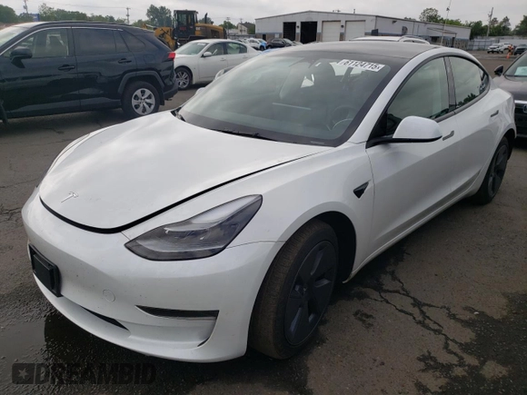 2023 Tesla Model 3 with VIN 5YJ3E1EA6PF563331, listed as a Copart auction lot 61124715 with 26,198 mi miles and Salvage title. Bid and sale history available at DreamBid. Image 1.