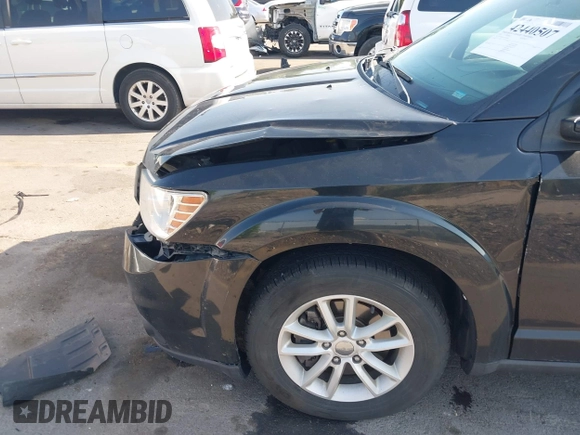 2013 Dodge Journey SXT with VIN 3C4PDDBG1DT606887, listed as a IAAI auction lot 42440507 with 250,836 mi miles and . Bid and sale history available at DreamBid. Image 13.