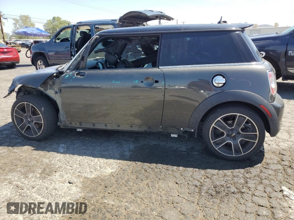 2012 MINI Hardtop S with VIN WMWSV3C53CTY29714, listed as a Copart auction lot 52370175 with 94,536 mi miles and Salvage title. Bid and sale history available at DreamBid. Image 2.