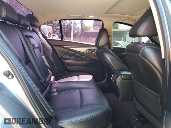 2015 Infiniti Q50 Premium z VIN JN1BV7ARXFM391291, wystawiony jako Copart lot #61765885 z przebiegiem 129 617 mil mil oraz Szkoda całkowita • Salvage title. Historia ofert i sprzedaży dostępna na DreamBid. Obrazek 10.