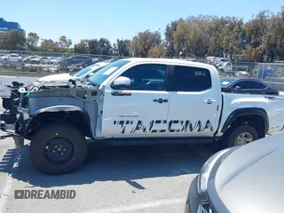 2019 Toyota Tacoma SR5 with VIN 3TMAZ5CN1KM096770, listed as a IAAI auction lot 42147168 with Not provided miles and . Bid and sale history available at DreamBid. Image 13.