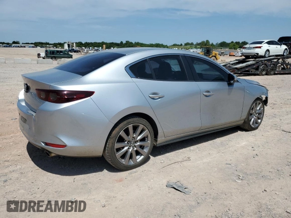 2019 Mazda 3 Select with VIN JM1BPACL9K1110896, listed as a Copart auction lot 62395685 with 141,544 mi miles and Salvage title. Bid and sale history available at DreamBid. Image 3.
