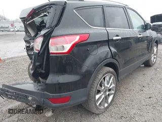 2014 Ford Escape SE z VIN 1FMCU9G94EUD64427, wystawiony jako IAAI lot #41965103 z przebiegiem 66 429 mil mil oraz . Historia ofert i sprzedaży dostępna na DreamBid. Obrazek 12.