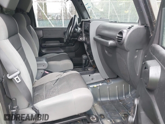 2007 Jeep Wrangler X with VIN 1J4FA24127L231409, listed as a IAAI auction lot 41971429 with 181,855 mi miles and . Bid and sale history available at carsss.com. Image 5.