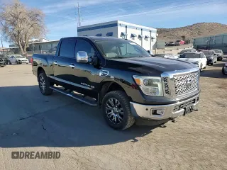 2017 Nissan Titan SL z VIN 1N6BA1F20HN522403, wystawiony jako Copart lot #87477114 z przebiegiem 98 084 mil mil oraz Szkoda całkowita • Salvage title. Historia ofert i sprzedaży dostępna na DreamBid. Obrazek 10.