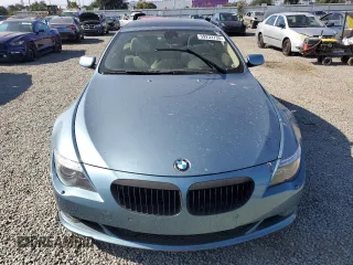 2009 BMW 6 Series 650i z VIN WBAEA535X9CV92748, wystawiony jako Copart lot #59233735 z przebiegiem 116 797 mil mil oraz Czysty tytuł • Clean title. Historia ofert i sprzedaży dostępna na DreamBid. Obrazek 5.