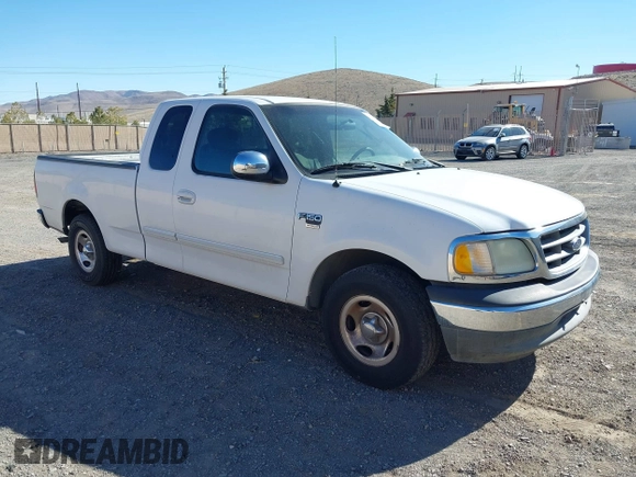 2002 Ford F-150 XL with VIN 1FTRX17W22KE34494, listed as a IAAI auction lot 41689313 with 250,243 mi miles. Bid and sale history available at carsss.com. Image 1.