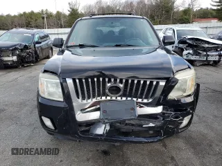 2008 Mercury Mariner Premier z VIN 4M2CU97168KJ31769, wystawiony jako Copart lot #50248325 z przebiegiem 133 450 mil mil oraz Szkody całkowita. Historia ofert i sprzedaży dostępna na DreamBid. Obrazek 5.