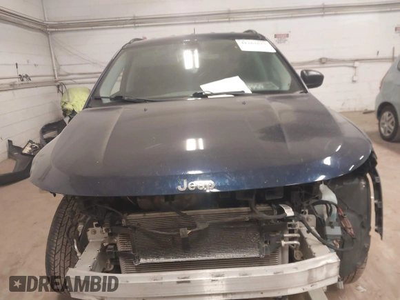 2020 Jeep Compass Latitude with VIN 3C4NJDBB7LT157086, listed as a IAAI auction lot 41263623 with 103,783 mi miles and . Bid and sale history available at DreamBid. Image 12.