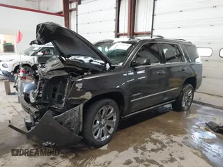 2016 GMC Yukon Denali with VIN 1GKS2CKJ8GR215954, listed as a IAAI auction lot 41362739 with 143,982 mi miles. Bid and sale history available at carsss.com. Image 16.