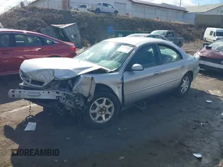 2000 Mercury Sable LS Premium with VIN 1MEFM55S3YG647919, listed as a IAAI auction lot 41677265 with 131,528 mi miles. Bid and sale history available at carsss.com. Image 2.