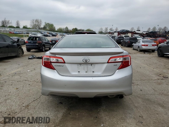 2013 Toyota Camry L with VIN 4T1BF1FK4DU649008, listed as a Copart auction lot 52620545 with 206,077 mi miles and Salvage Title. Bid and sale history available at DreamBid. Image 6.