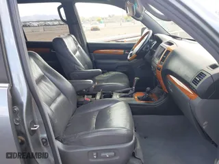 2004 Lexus GX 470 with VIN JTJBT20X540051909, listed as a IAAI auction lot 42083375 with 191,974 mi miles. Bid and sale history available at carsss.com. Image 5.