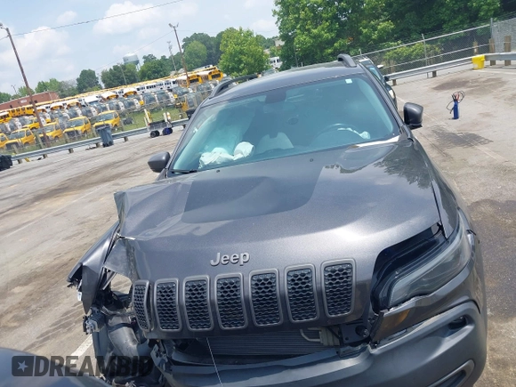 2020 Jeep Cherokee Trailhawk with VIN 1C4PJMBX5LD530720, listed as a IAAI auction lot 42404948 with 99,606 mi miles and . Bid and sale history available at DreamBid. Image 12.