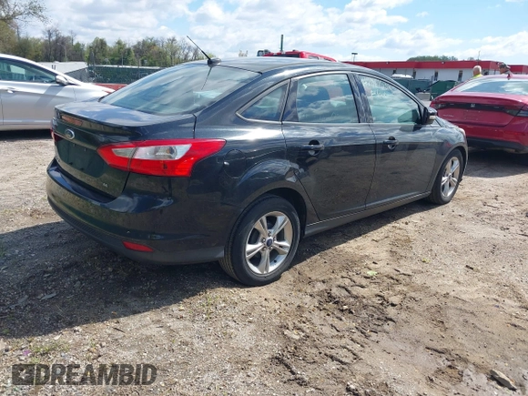 2014 Ford Focus SE with VIN 1FADP3F27EL189068, listed as a IAAI auction lot 42047538 with 196,785 mi miles. Bid and sale history available at carsss.com. Image 4.