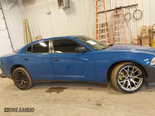 2014 Dodge Charger Police with VIN 2C3CDXAT5EH218901, listed as a IAAI auction lot 41723531 with 216,643 mi miles. Bid and sale history available at carsss.com. Image 13.