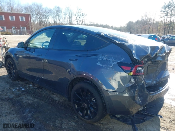 2023 Tesla Model Y Long Range with VIN 7SAYGAEE9PF905943, listed as a IAAI auction lot 41444255 with 11,179 mi miles. Bid and sale history available at carsss.com. Image 3.