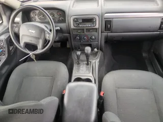 2004 Jeep Grand Cherokee Laredo with VIN 1J4GW48S84C200259, listed as a Copart auction lot 51002325 with 158,193 mi miles and Salvage Title. Bid and sale history available at carsss.com. Image 8.