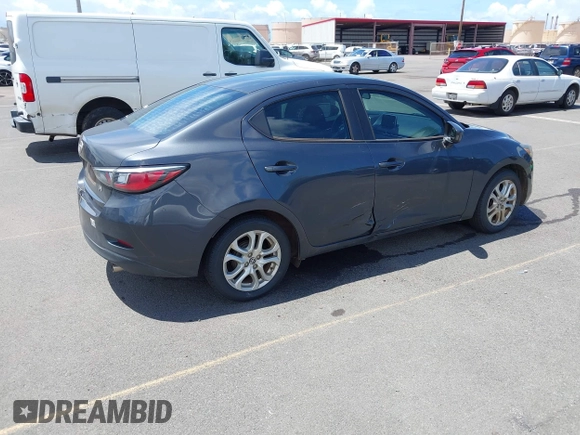 2016 Scion iA z VIN 3MYDLBZV5GY113222, wystawiony jako IAAI lot #42076460 z przebiegiem 112 249 mil mil oraz . Historia ofert i sprzedaży dostępna na DreamBid. Obrazek 4.