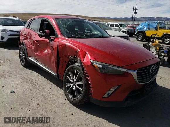 2017 Mazda CX-3 Grand Touring z VIN JM1DKFD74H0167026, wystawiony jako Copart lot #48817725 z przebiegiem 84 053 mil mil oraz Szkody całkowita. Historia ofert i sprzedaży dostępna na DreamBid. Obrazek 12.