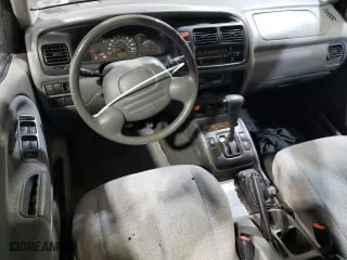 2000 Suzuki Grand Vitara JLX with VIN JS3TD62VXY4125624, listed as a Copart auction lot 87957045 with 175,923 mi miles and Salvage Title. Bid and sale history available at carsss.com. Image 8.