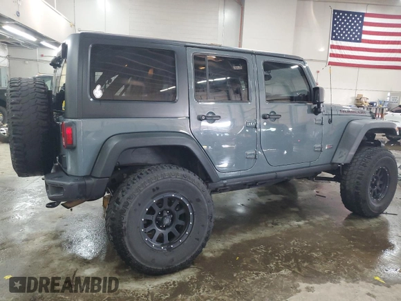 2013 Jeep Wrangler Unlimited Rubicon with VIN 1C4BJWFG7DL691514, listed as a Copart auction lot 42449245 with 114,640 mi miles and Salvage Title. Bid and sale history available at carsss.com. Image 3.