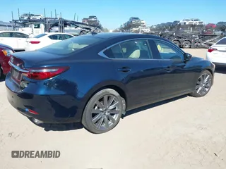 2021 Mazda 6 Grand Touring with VIN JM1GL1TY3M1619771, listed as a IAAI auction lot 40964809 with 25,816 mi miles and . Bid and sale history available at DreamBid. Image 4.