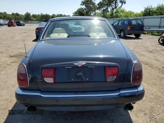 2001 Bentley Arnage with VIN SCBLC31E31CX05992, listed as a Copart auction lot 60462974 with 253,028 mi miles and Salvage Title. Bid and sale history available at DreamBid. Image 6.