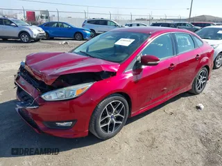 2015 Ford Focus SE with VIN 1FADP3F25FL273973, listed as a IAAI auction lot 41801026 with 138,482 mi miles. Bid and sale history available at carsss.com. Image 2.