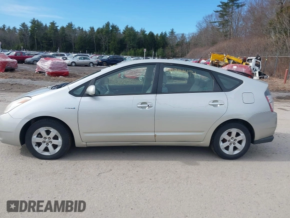 2005 Toyota Prius with VIN JTDKB20U653014332, listed as a IAAI auction lot 41914494 with 128,147 mi miles. Bid and sale history available at carsss.com. Image 12.