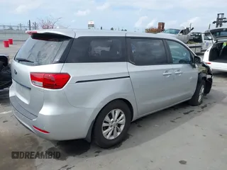 2015 Kia Sedona L with VIN KNDMA5C16F6027418, listed as a IAAI auction lot 42129259 with 78,097 mi miles. Bid and sale history available at carsss.com. Image 4.