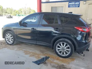 2015 Mazda CX-5 Grand Touring with VIN JM3KE4DY7F0481883, listed as a IAAI auction lot 42091709 with 184,248 mi miles and . Bid and sale history available at DreamBid. Image 15.