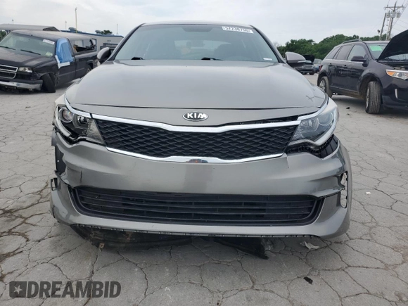 2018 Kia Optima S с VIN 5XXGT4L31JG183167, выставлен на аукционе Copart как лот 57238755 с пробегом 78 663 миль миль и Списание • Salvage title. История ставок и продаж доступна на DreamBid. Изображение 5.
