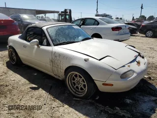 1990 Mazda MX-5 Miata z VIN JM1NA3511L0106323, wystawiony jako Copart lot #50449685 z przebiegiem 179 018 mil mil oraz Szkoda całkowita • Salvage title. Historia ofert i sprzedaży dostępna na DreamBid. Obrazek 4.