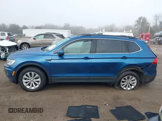 2019 Volkswagen Tiguan SE with VIN 3VV2B7AX4KM017280, listed as a IAAI auction lot 41786487 with 119,949 mi miles and . Bid and sale history available at DreamBid. Image 14.