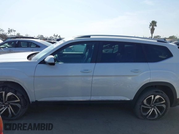 2023 Volkswagen Atlas SEL with VIN 1V2BR2CA7PC527099, listed as a IAAI auction lot 42099076 with 13,710 mi miles and . Bid and sale history available at DreamBid. Image 14.