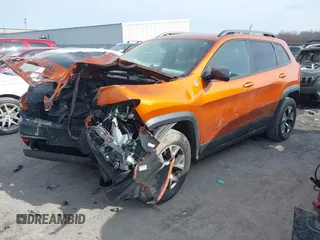 2015 Jeep Cherokee Trailhawk with VIN 1C4PJMBB3FW642266, listed as a IAAI auction lot 41510571 with 72,030 mi miles and . Bid and sale history available at DreamBid. Image 17.