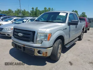 2009 Ford F-150 STX with VIN 1FTRX12W29FA64321, listed as a IAAI auction lot 42653001 with 158,428 mi miles and . Bid and sale history available at DreamBid. Image 2.
